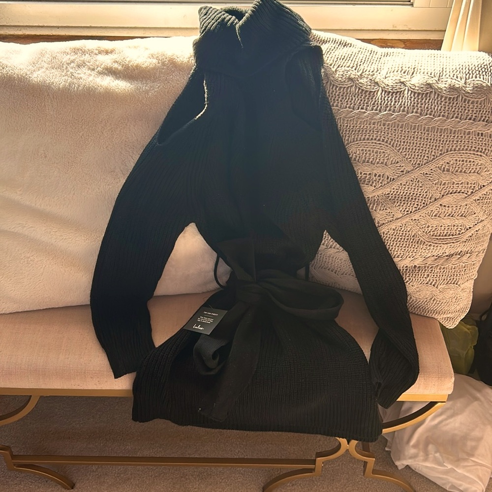 Black turtle neck sweater open shoulder cut out